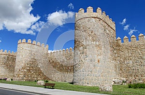 Wall, tower and bastion of Avila, Spain, made of yellow stone bricks