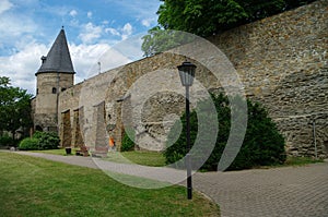 Wall and tower of medieval fortress, Schlossgarten, in Andernach, Rhine valley, Germany.