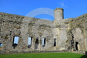 Wall and turret of historic stone castle