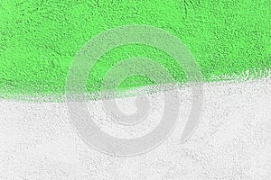 Wall two tone colors: green verdant and white paint on concrete surface design abstract texture background blank empty