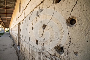 Uneven wall with holes photo