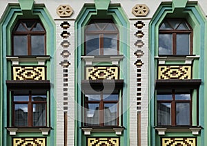 Wall of vintage building with windows