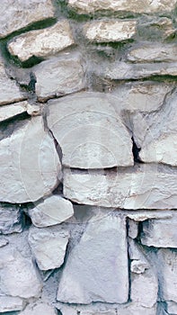 Wall of white and gray beautiful old stones