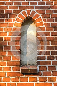 Wall with a window of the former church of the city of Rauschen