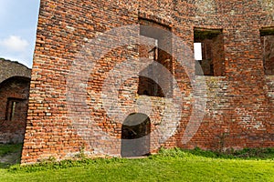 The wall and window openings from the courtyard of the ruin castle Teylingen in the south-holland village of Sassenheim