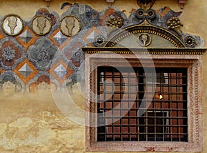 Wall with window in Piazza Dei Signori, Verona