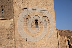 Wall and window of the tower of the Koutoubia mosque is the iconic monument of Marrakech is located next to the Jemaa el Fna