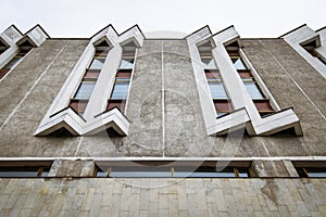 Wall with windows fragment of building in Saint-Petersburg, Russia, Soviet modernism brutalism photo