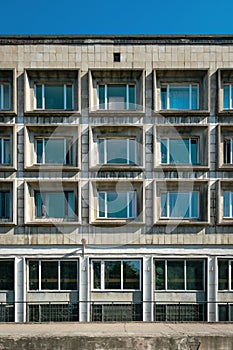Wall with windows fragment ofl building in Saint-Petersburg, Russia, Soviet modernism brutalism photo