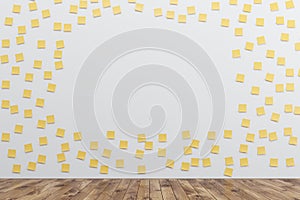 Wall with yellow sticky notes and hole