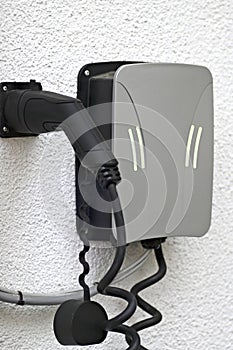 Wallbox to comfortable recharge the electrically powered car at home.