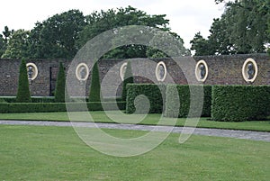 Walled garden with statues and topiary