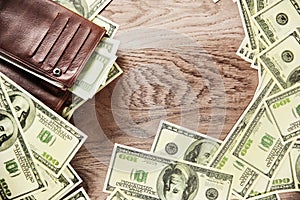 Wallet and banknotes of dollars