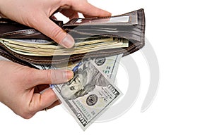Wallet with dollars in the woman