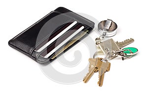 Wallet and keys on white background