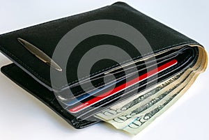 A wallet with some $20 bills and some credit cards