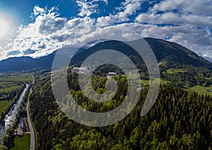 Wallfahrtskirche frauenberg is a beautiful church in the middle of Austria, drone panorama view of a church next to enn river in photo