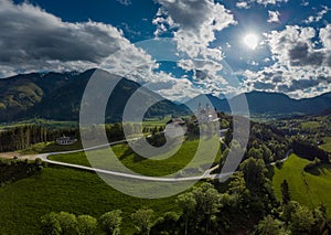 Wallfahrtskirche frauenberg is a beautiful church in the middle of Austria, drone panorama view of a church next to enn river in photo