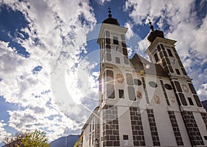 Wallfahrtskirche frauenberg is a beautiful church in the middle of Austria, Frog view of a church next to enn river in central photo