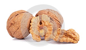 wallnut and a cracked walnut isolated on the white background