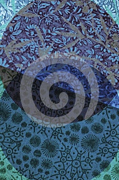 A wallpaper of blue circles on printed paper.