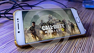The wallpaper of Call of Duty Mobile version game on a smartphone