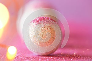 Wallpaper phone with round shapes and pink glitter.Abstract background in lilac and white colors with round balls.Shiny