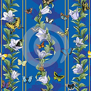 Wallpaper with a seamless pattern with butterflies and flowers on a blue background.