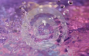 Wallpapers. Frozen movement of water. Drops of water falling and splashing. Sparkles, reflections of light.