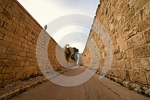 The walls around the Jewish Quarter in the Old City and the road that surrounds it