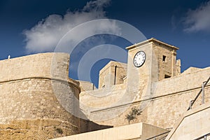 The walls and clock of the Citadel Victoria Gozo