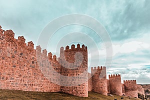 Walls of the historic city of Avila, Castilla y Leon, Spain. Teal and orange mood.