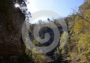 Walls of Jericho Landscape with Sun Behind Shadowed Wall