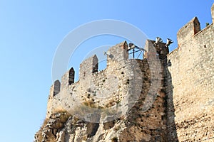 Walls with lamps of Scaliger Castle in Malcesine