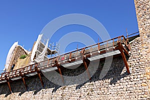 The walls of the Monteriggioni fortress under repair. photo