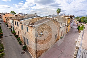 Walls and narrow streets of Alcudia old town, Mallorca, Spain