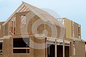 the walls of the new house are covered with plywood frame