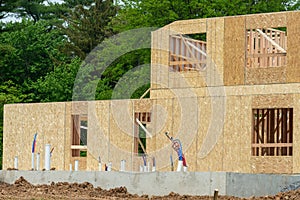 the walls of the new house are covered with plywood site