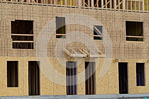 the walls of the new house are covered with plywood site