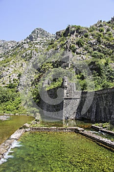 Walls old fortress of Kotor abruptly climbing uphill. Kotor, Montenegro