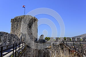 The walls of the old stone fortress.