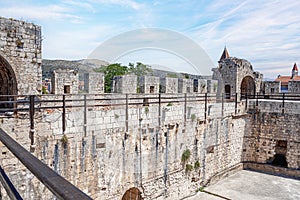 The walls of the old stone fortress.