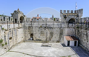 The walls of the old stone fortress.