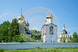 At walls of the Sacred and Nikolsky Pereslavsky monastery in the sunny July afternoon. Pereslavl-Zalessky