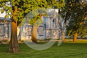 The walls of Smolny cathedral under sunset light.