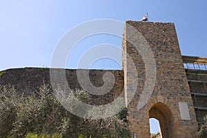 The walls and a tower of the Monteriggioni fortress. photo