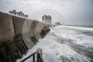 walls of water, rising from the ocean to devastate coastal cities photo