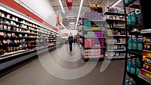 Walmart Supercenter retail store interior people on back aisle