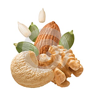 Walnut, almond, cashew nuts, pumpkin and sunflower seeds isolated on white background. Salad mix