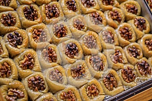 Walnut birds nest baklava or bulbul yuvasi dessert at a shop, Istanbul, Turkey